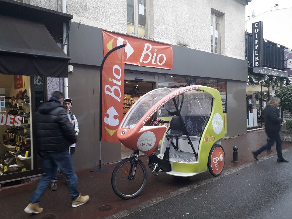 Carrefour Bio location d'un vélo taxi